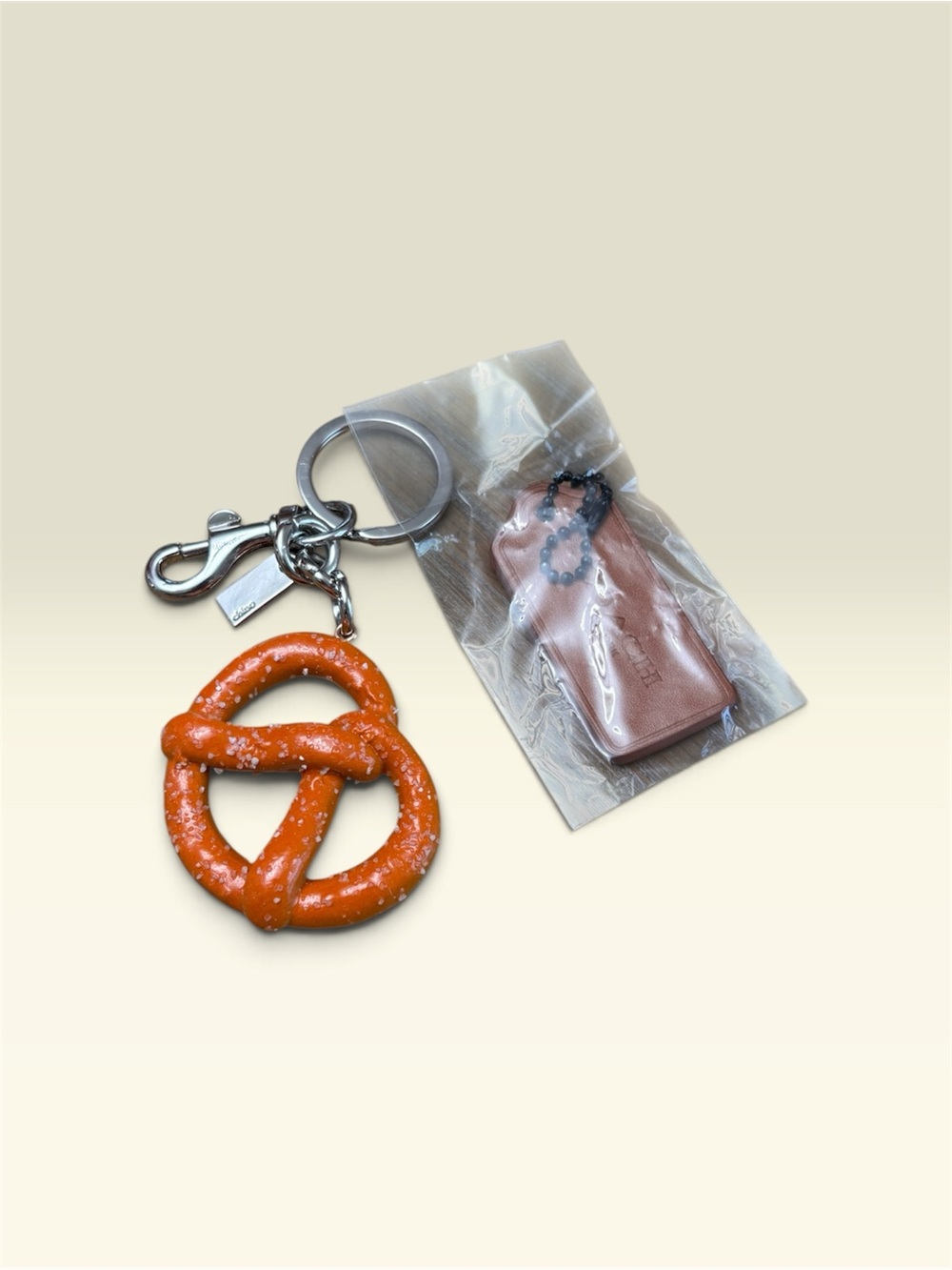 Orange Pretzel Keychain with Pink Charm